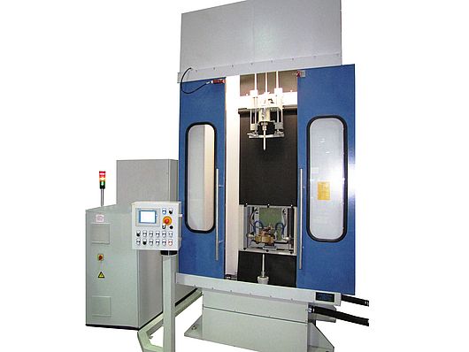 Vertical induction hardening machine